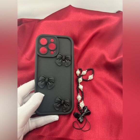 Sleek Black Bow iPhone 16 Pro Max Case with Pearl Strap - Picture 5 of 6